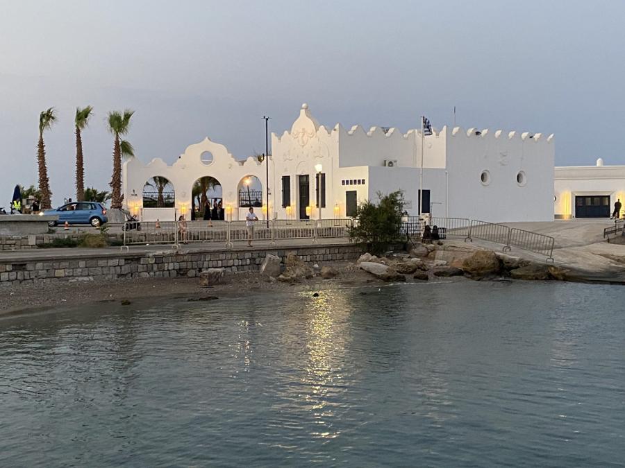 Elli Beach and the white Italian-era bathing pavilion at dusk, Rhodes