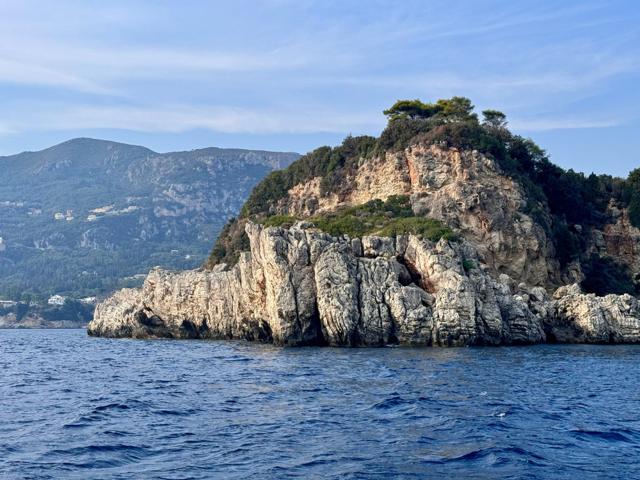 Limestone headland rising from the sea off Corfu