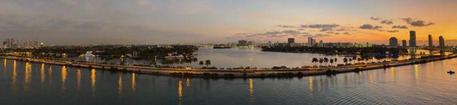 Miami skyline and Biscayne Bay causeway at sunset