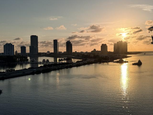 Miami Beach skyline silhouetted at sunset over Biscayne Bay