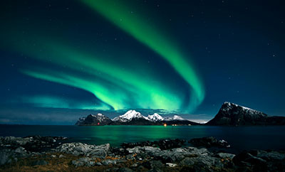 The Northern Lights, also known as Aurora Borealis, are a mesmerizing natural light display in the Earth's sky. 